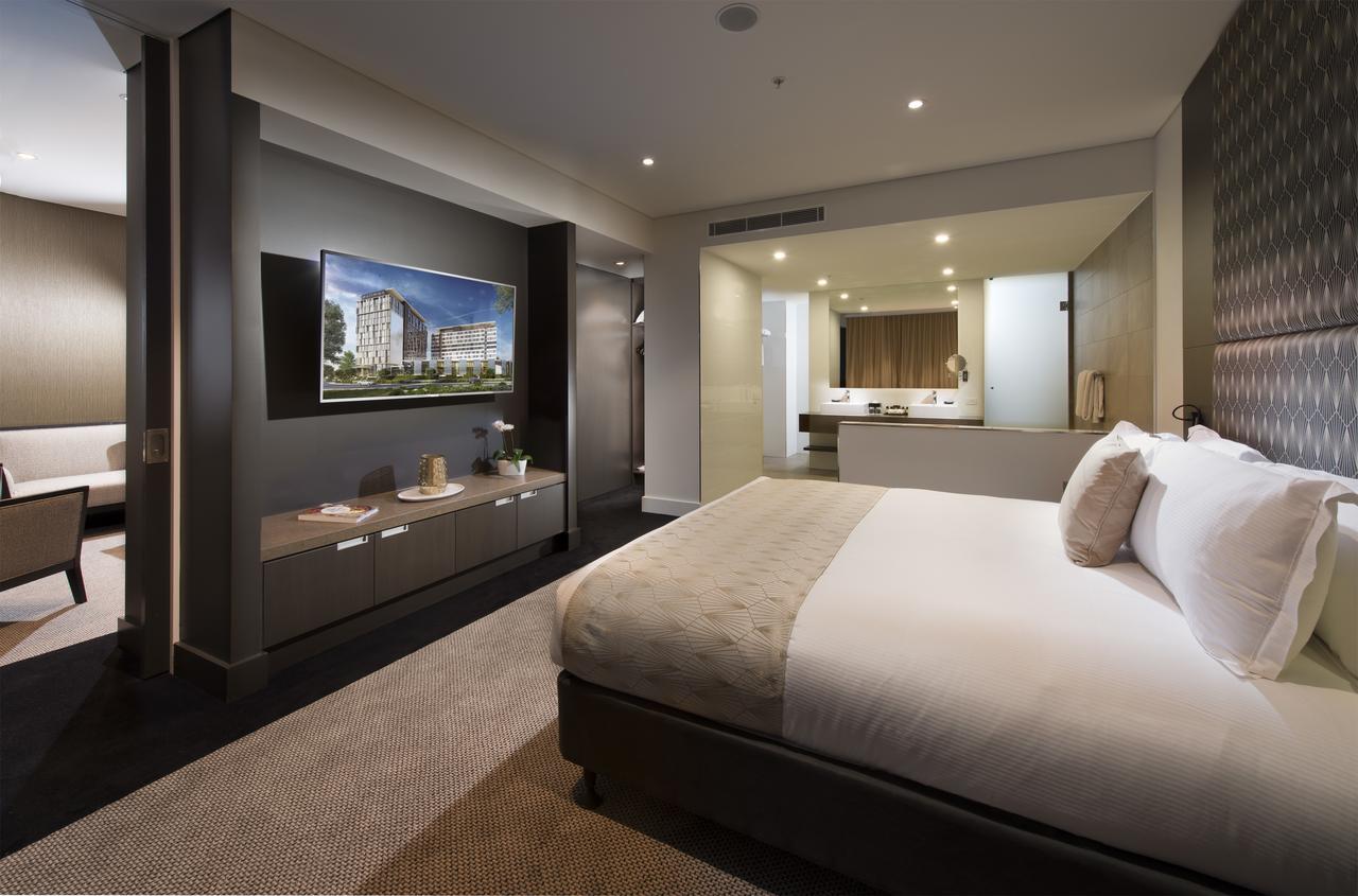Отель Pullman Brisbane Airport Экстерьер фото A bedroom at the hotel