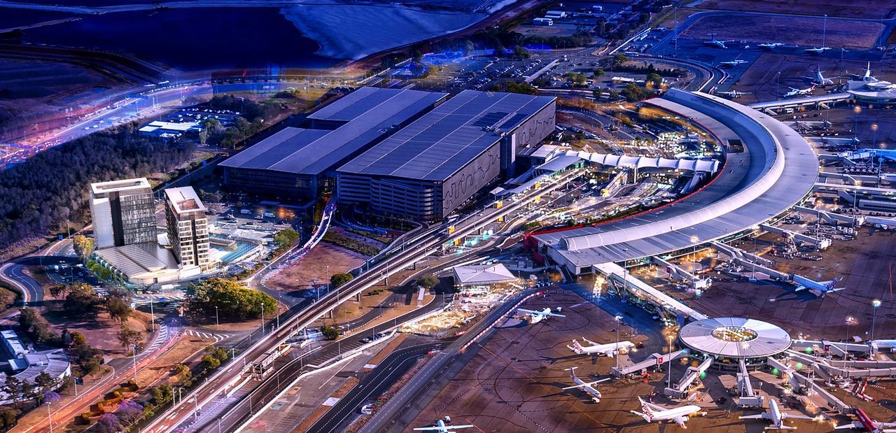 Отель Pullman Brisbane Airport Экстерьер фото Aerial view of the airport at night