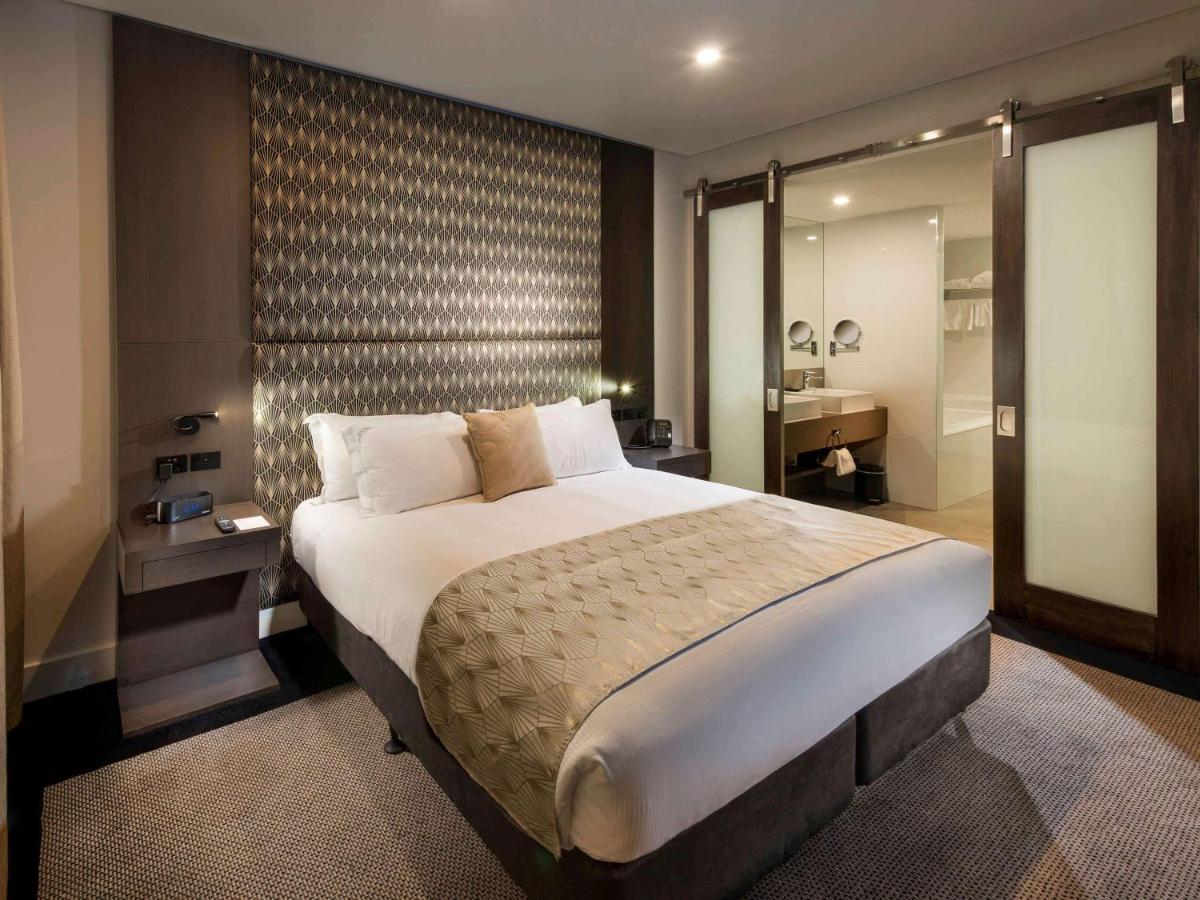 Отель Pullman Brisbane Airport Экстерьер фото A bedroom at the hotel